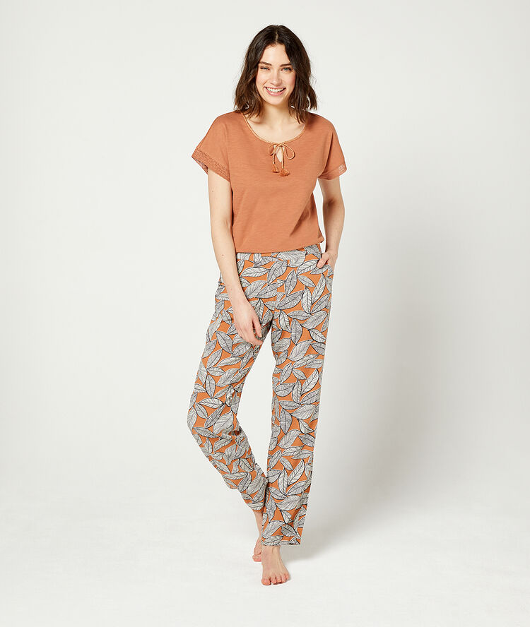 Trousers in a foliage print terracotta.