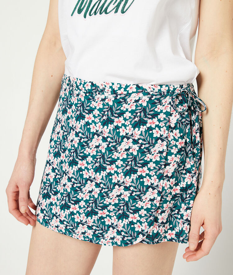 Wrap shorts in a floral print green.