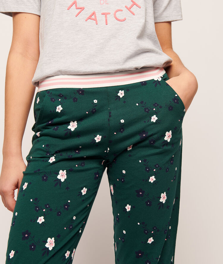 Trousers in tiny flowers print deep green.