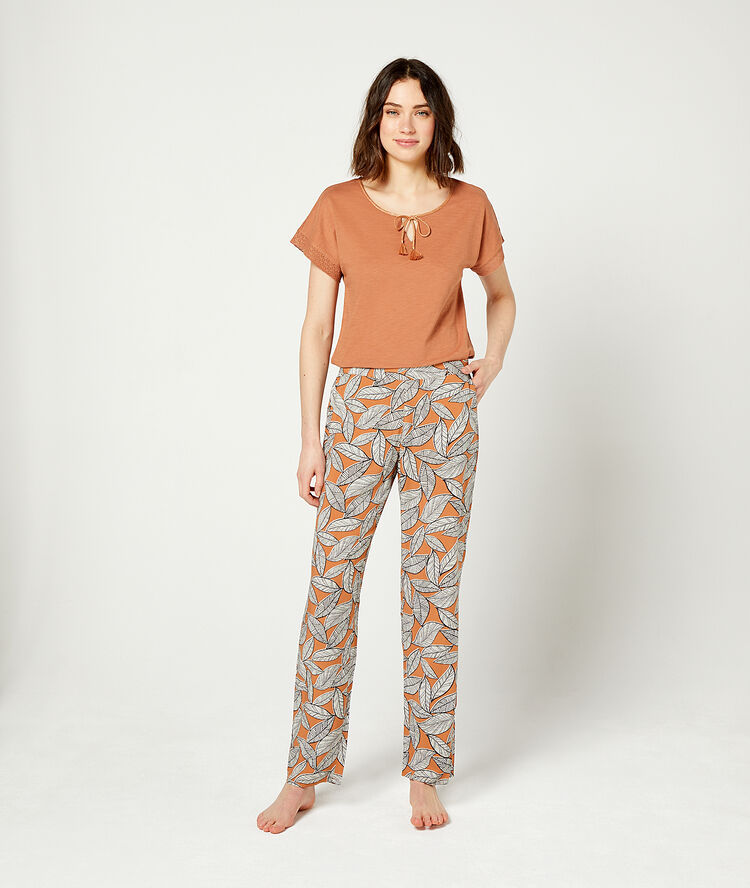 Trousers in a foliage print terracotta.