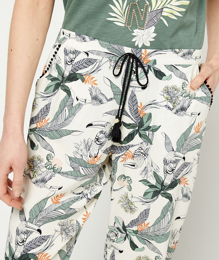 Trousers in a foliage print and tie detail off white.