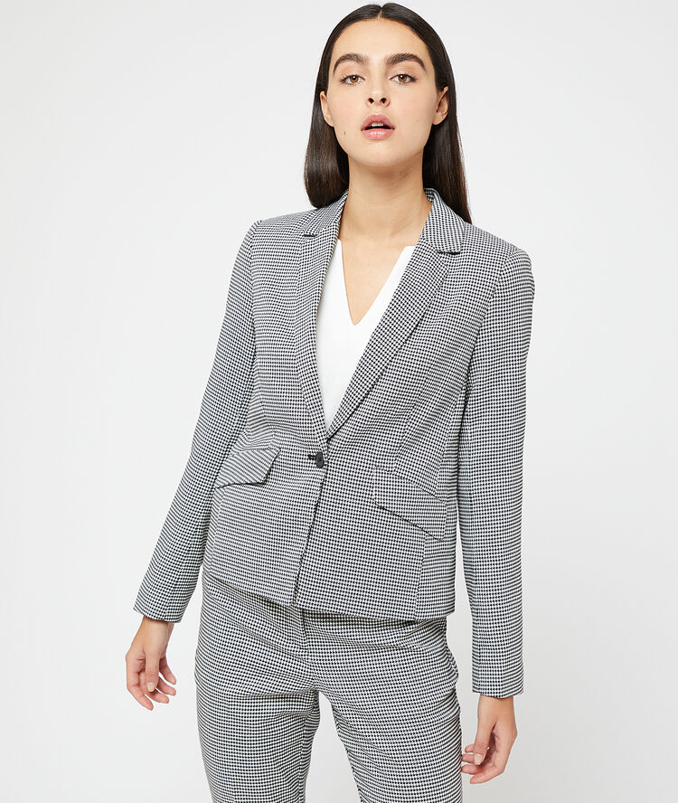 Veste de tailleur motifs pied de poule noir.