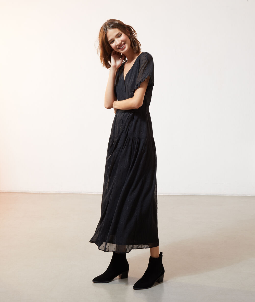 Robe longue en plumetis noir.