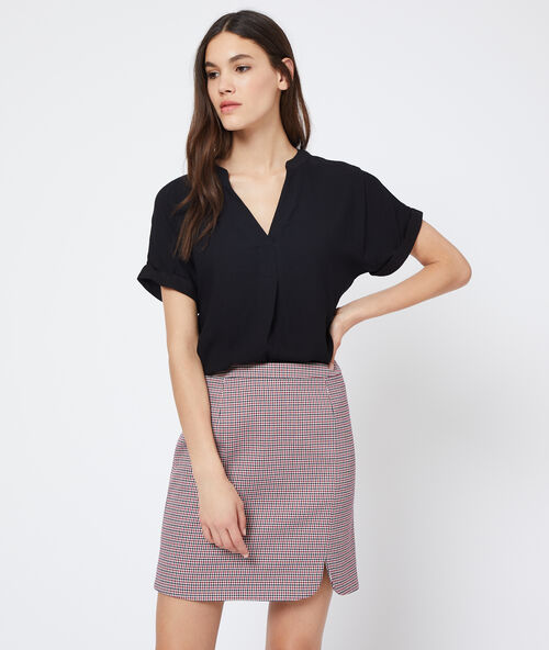 Jupe &agrave; motifs pied de poule marine.