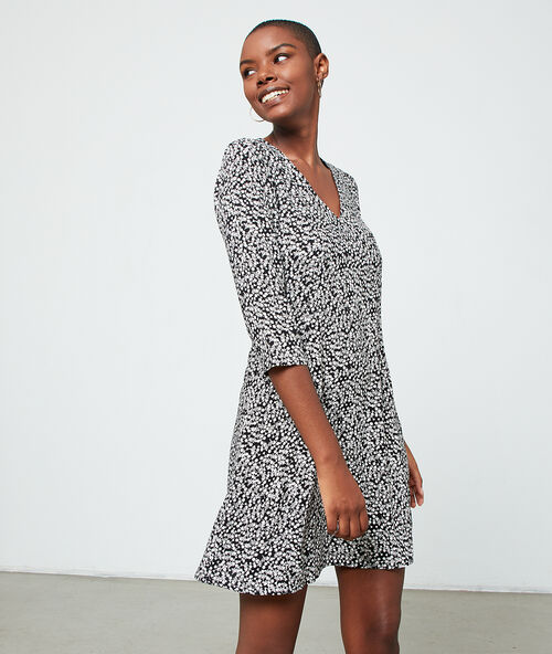 Dress in floral print black.