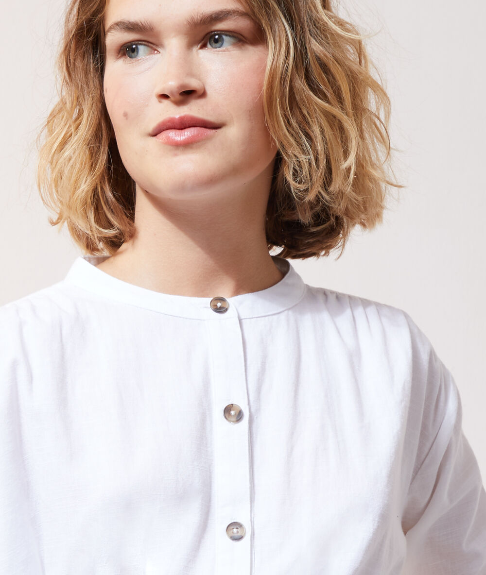 Buttoned playsuit ecru.