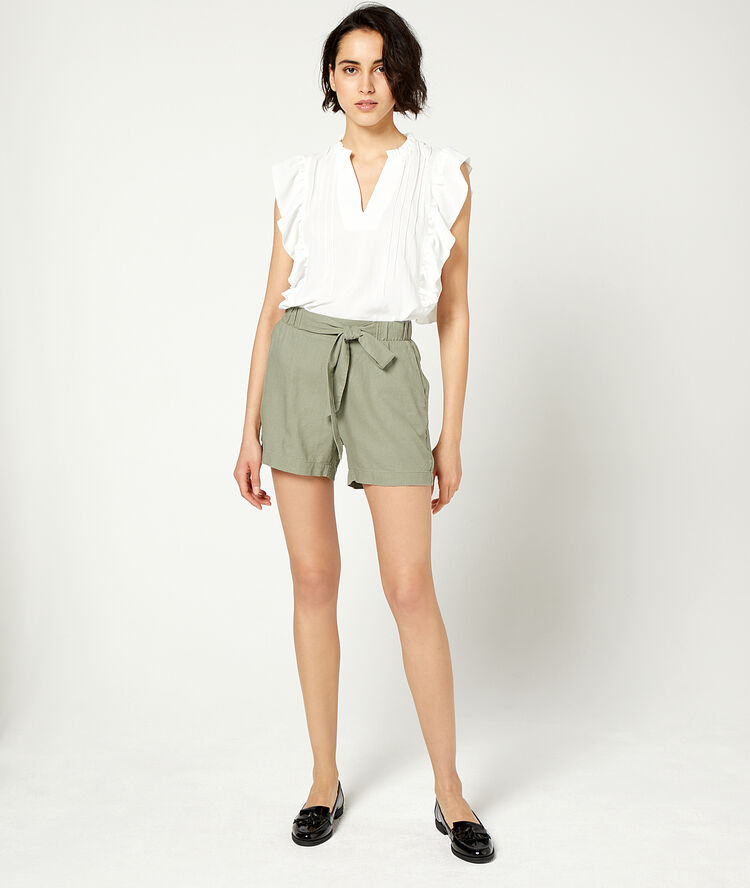 Ruffled blouse off white.