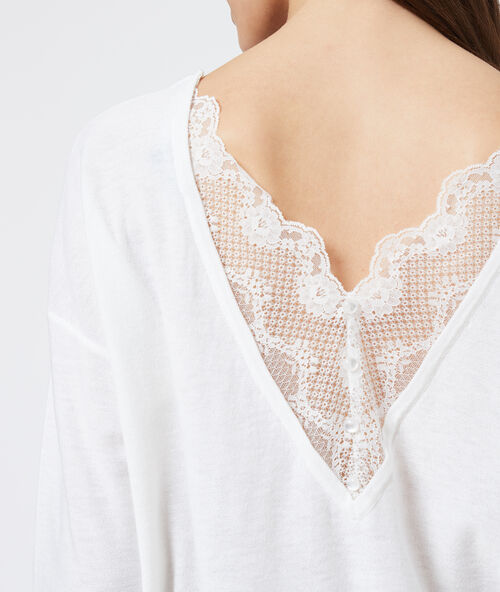 Jumper with plunging back in lace off-white.