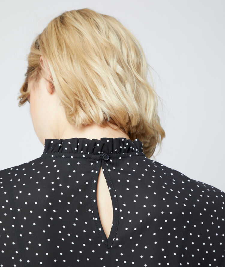 Blouse in dots black.