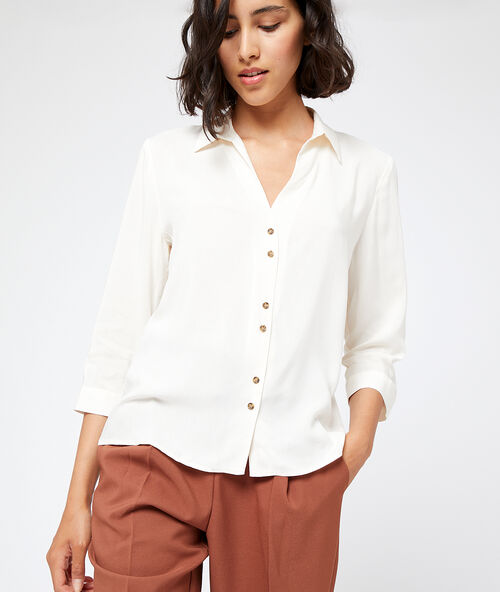 Shirt with amber coloured buttons  cream.