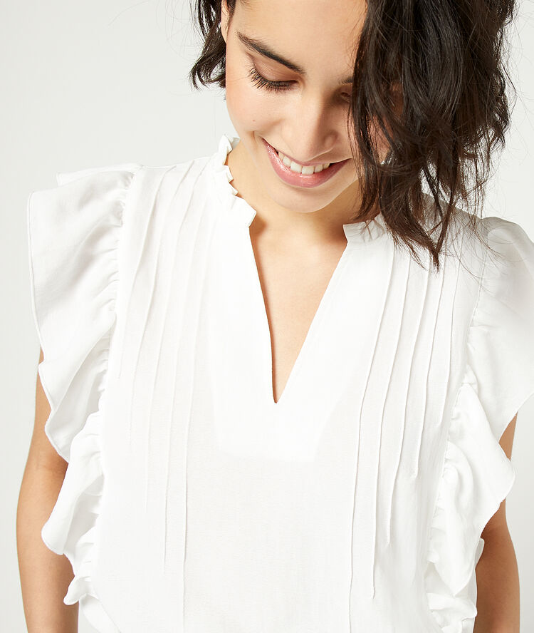 Ruffled blouse off white.