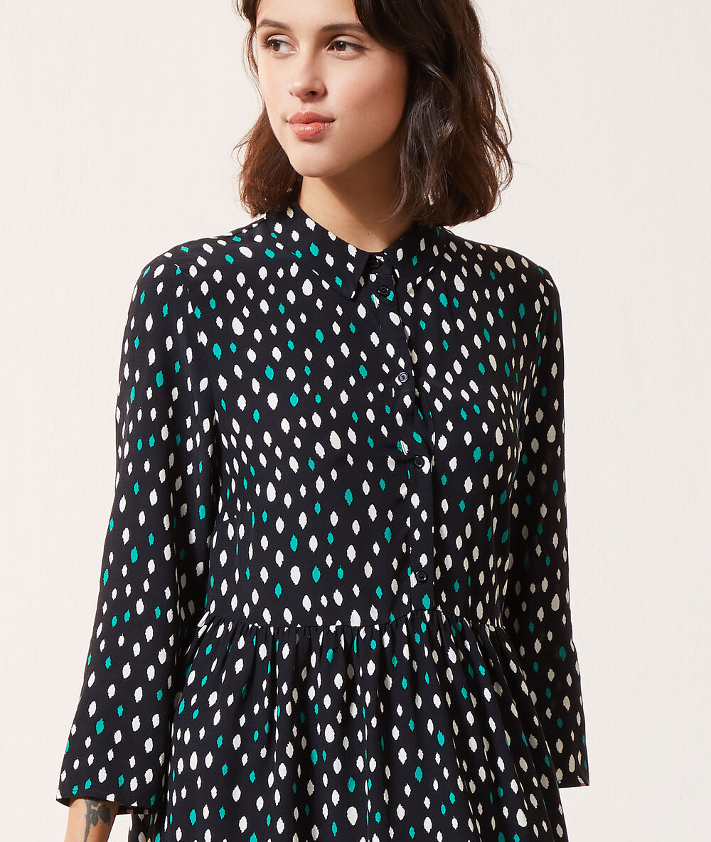 Button through dress in print black.