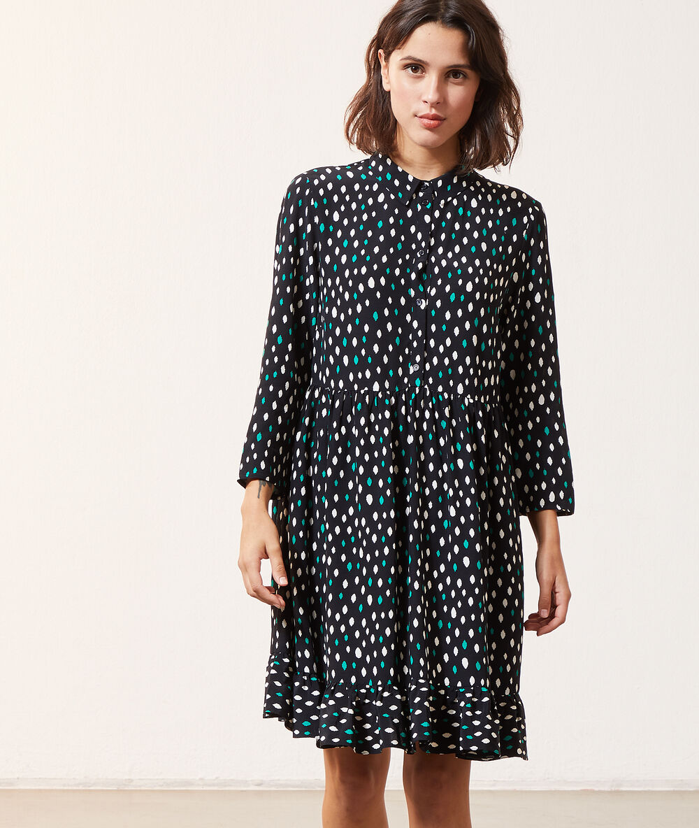 Button through dress in print black.