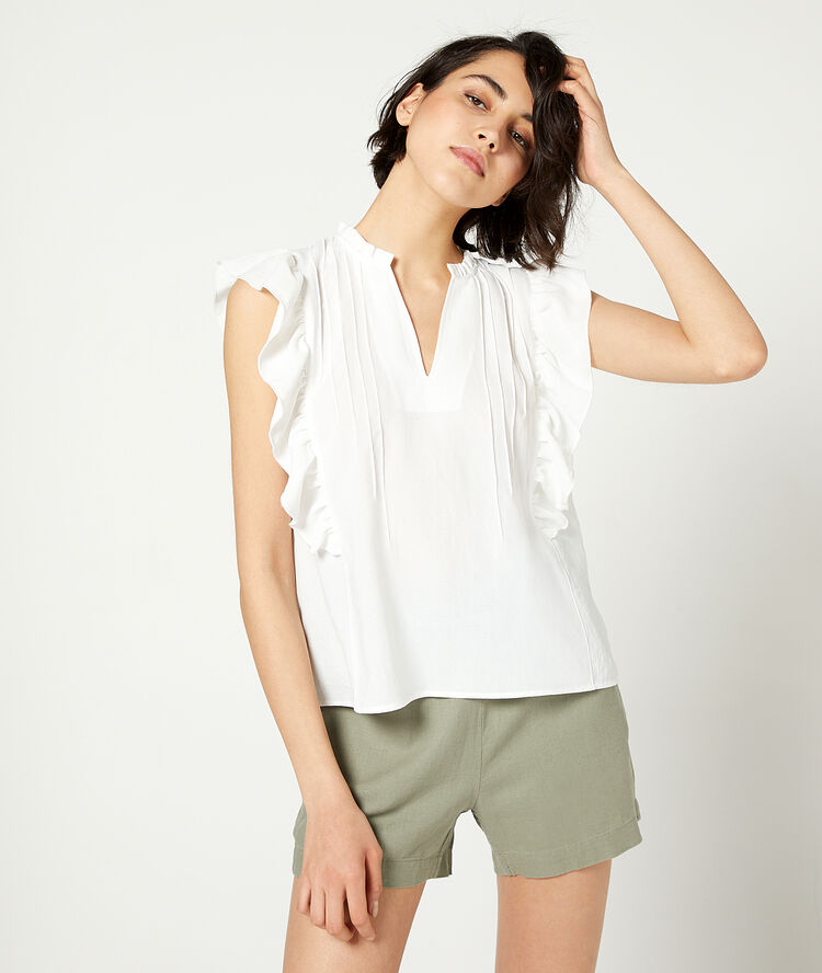 Ruffled blouse off white.